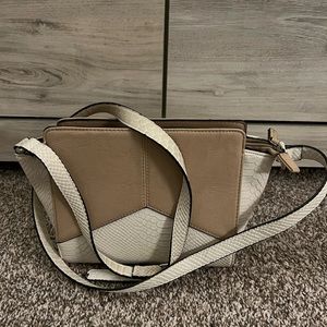 Tan and white snake skin bag